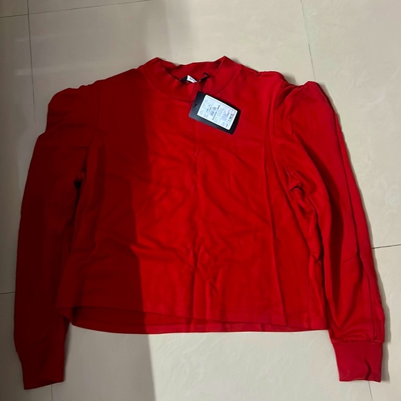 Zutano Tops - I am selling a top with full sleeves new with tag and is in red colour